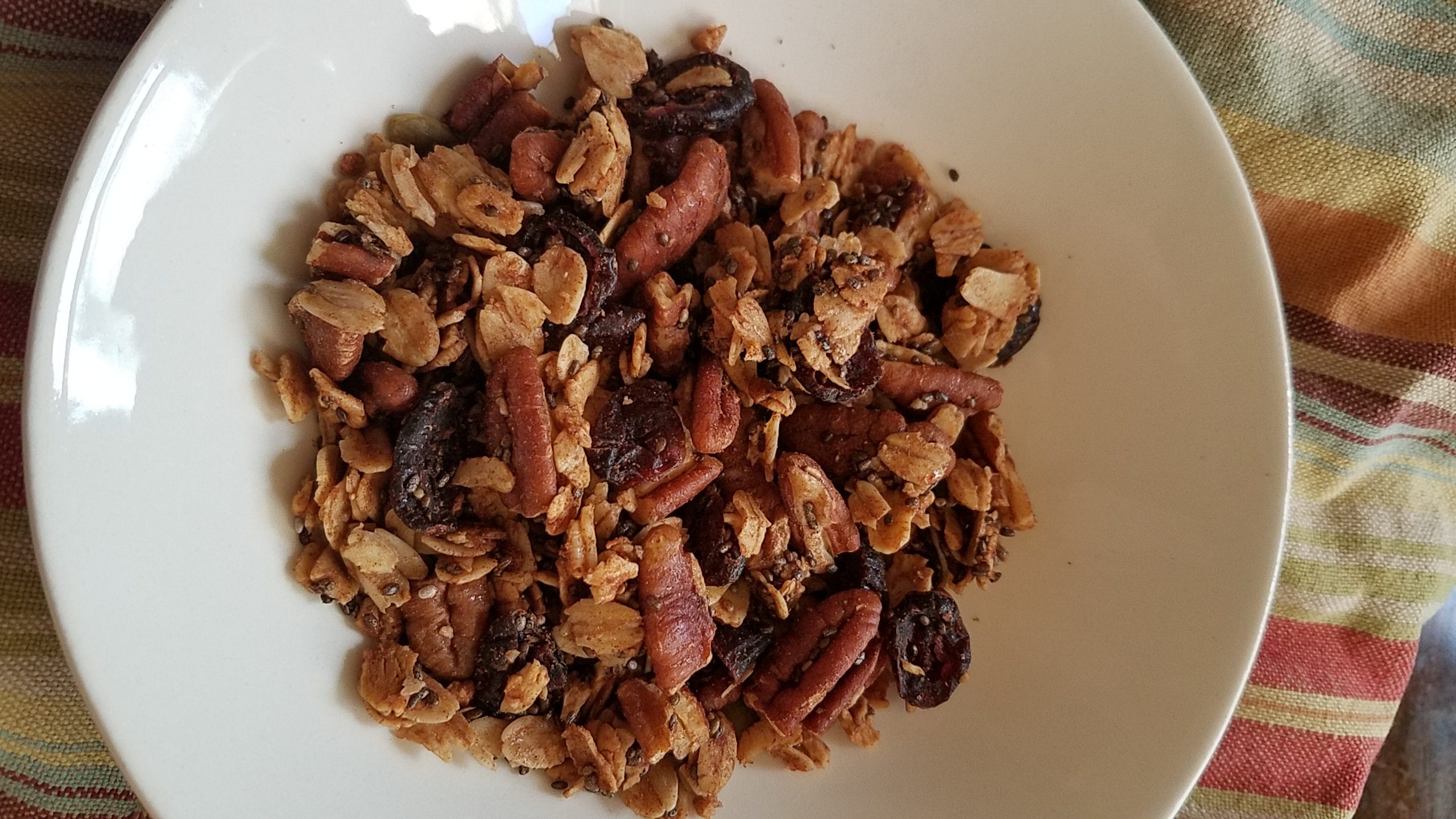 Homemade granola in white bowl