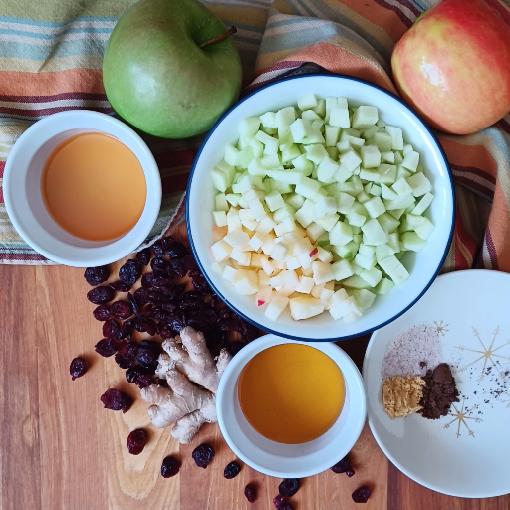Ingredients for Apple Chutney in bowl on cutting board