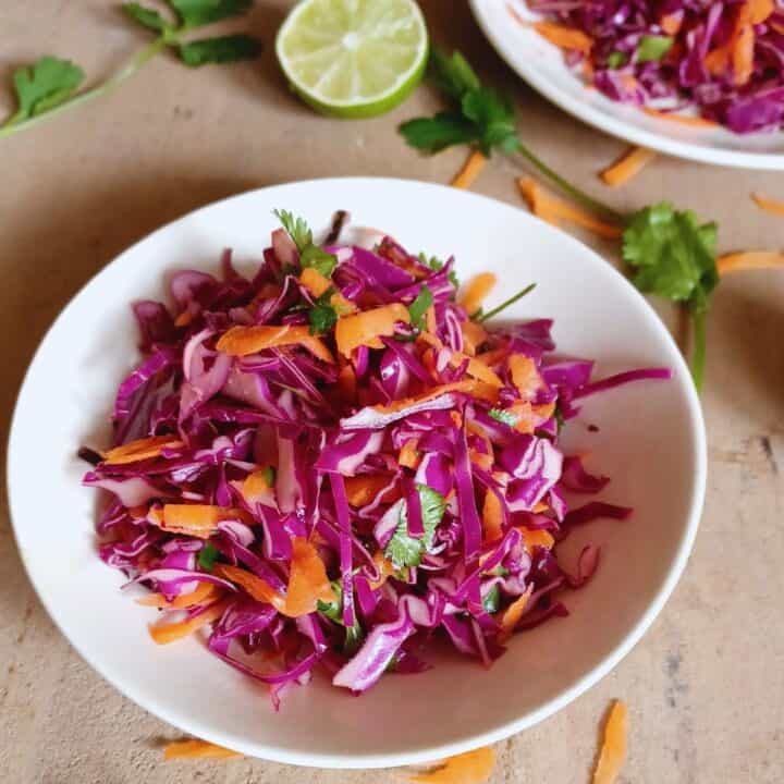 Small bowls filled with cilantro lime slaw